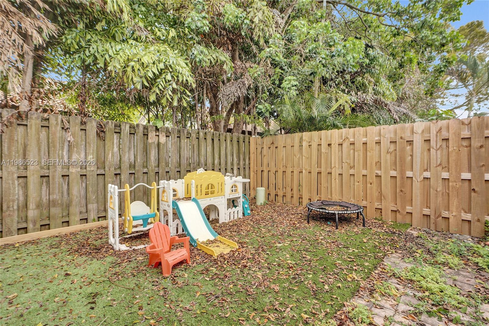 7402 Northwest 75th Street Tamarac, FL 33321 - Photo 26 of 43 Back Yard
