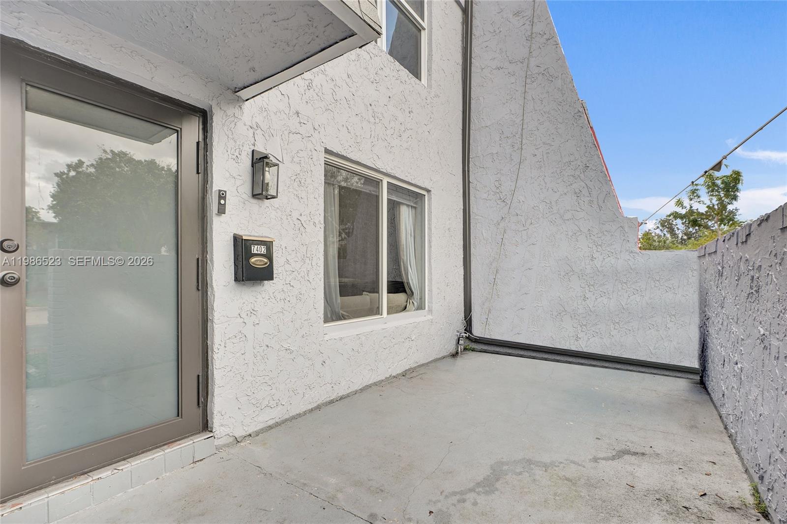 7402 Northwest 75th Street Tamarac, FL 33321 - Photo 9 of 43 Front Patio