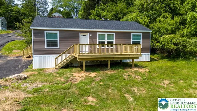 a house view with a garden space