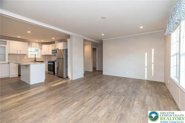 a view of kitchen with wooden floor