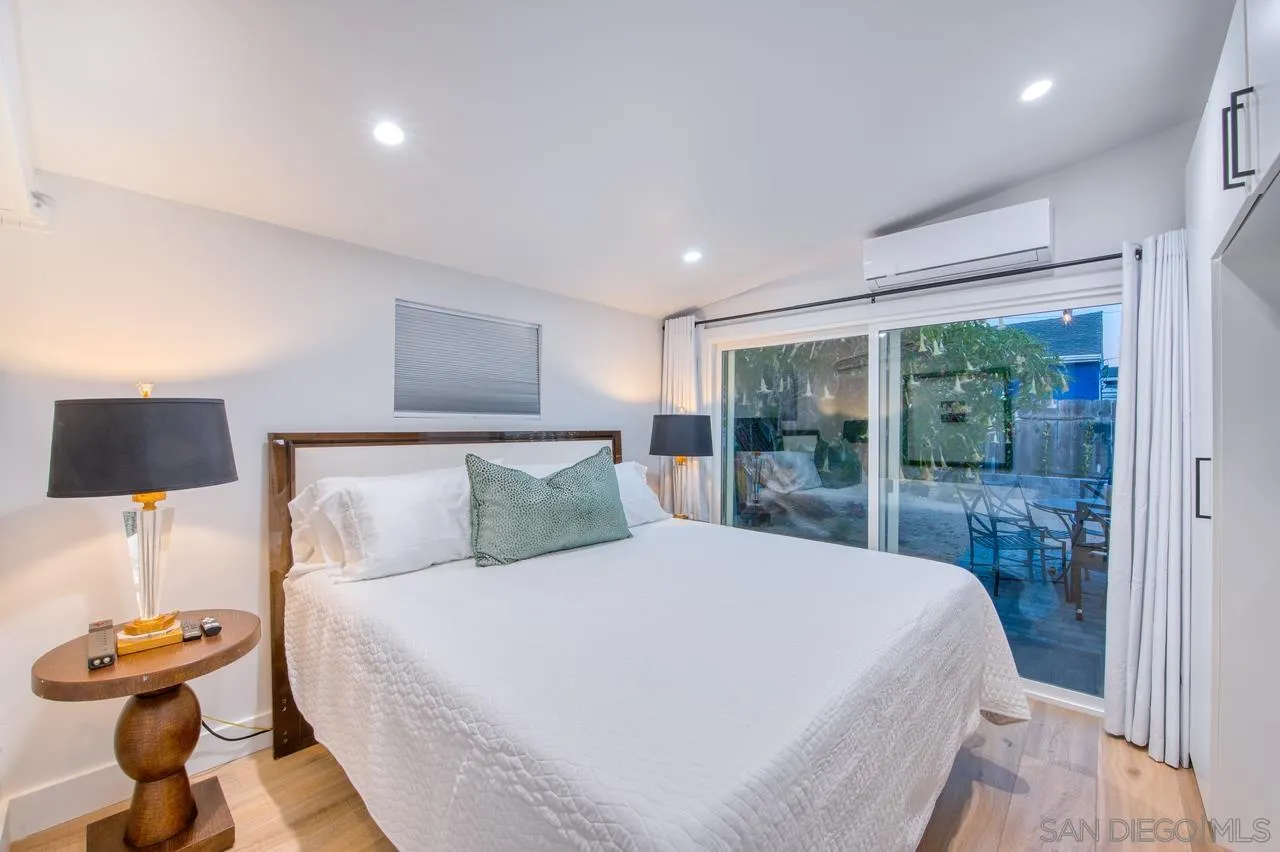 34082 La Serena Drive Dana Point, CA 92629 - Photo 18 of 43 a bedroom with a bed and a lamp on table