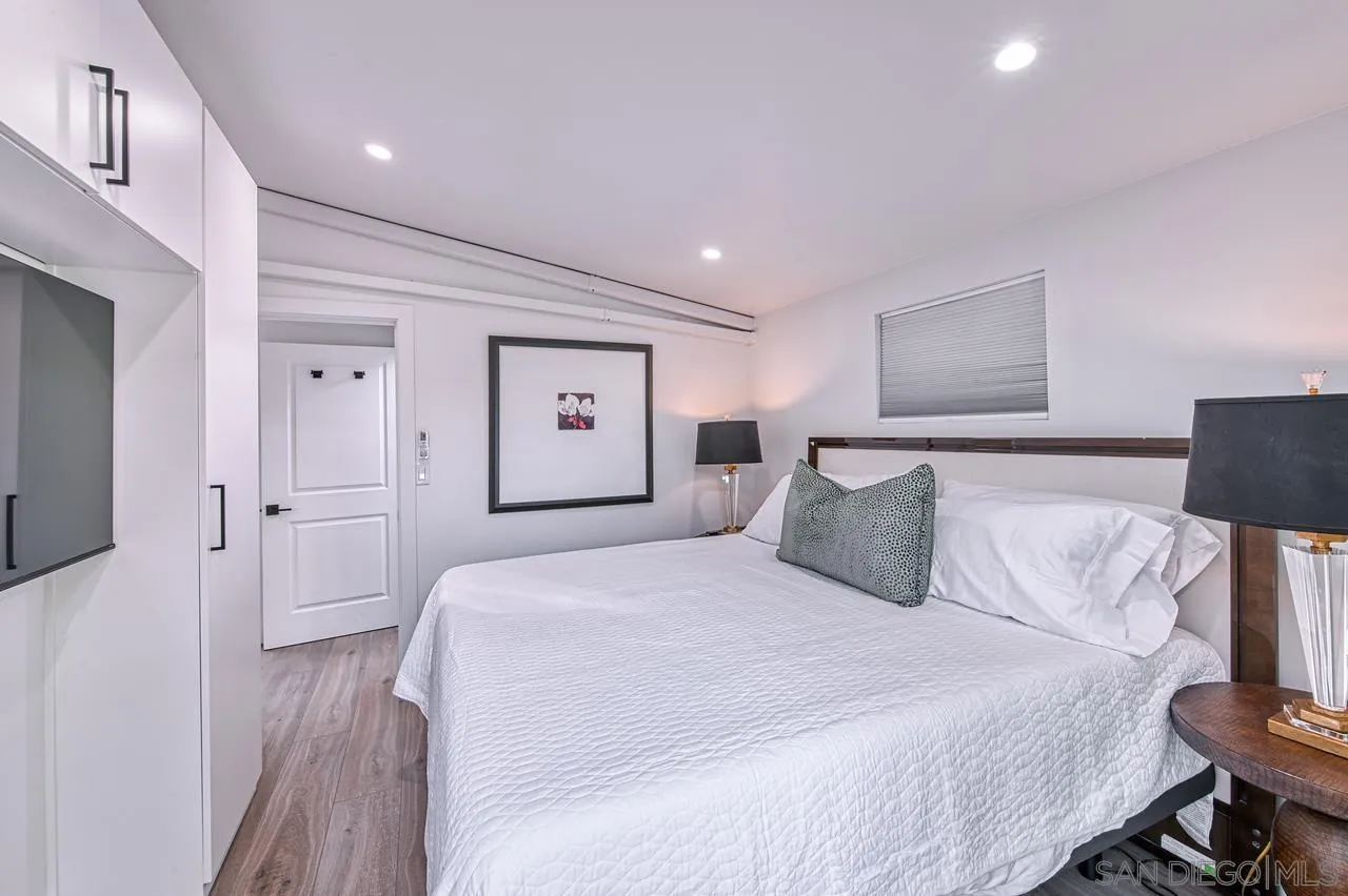 34082 La Serena Drive Dana Point, CA 92629 - Photo 22 of 43 a bedroom with a bed and a night stand