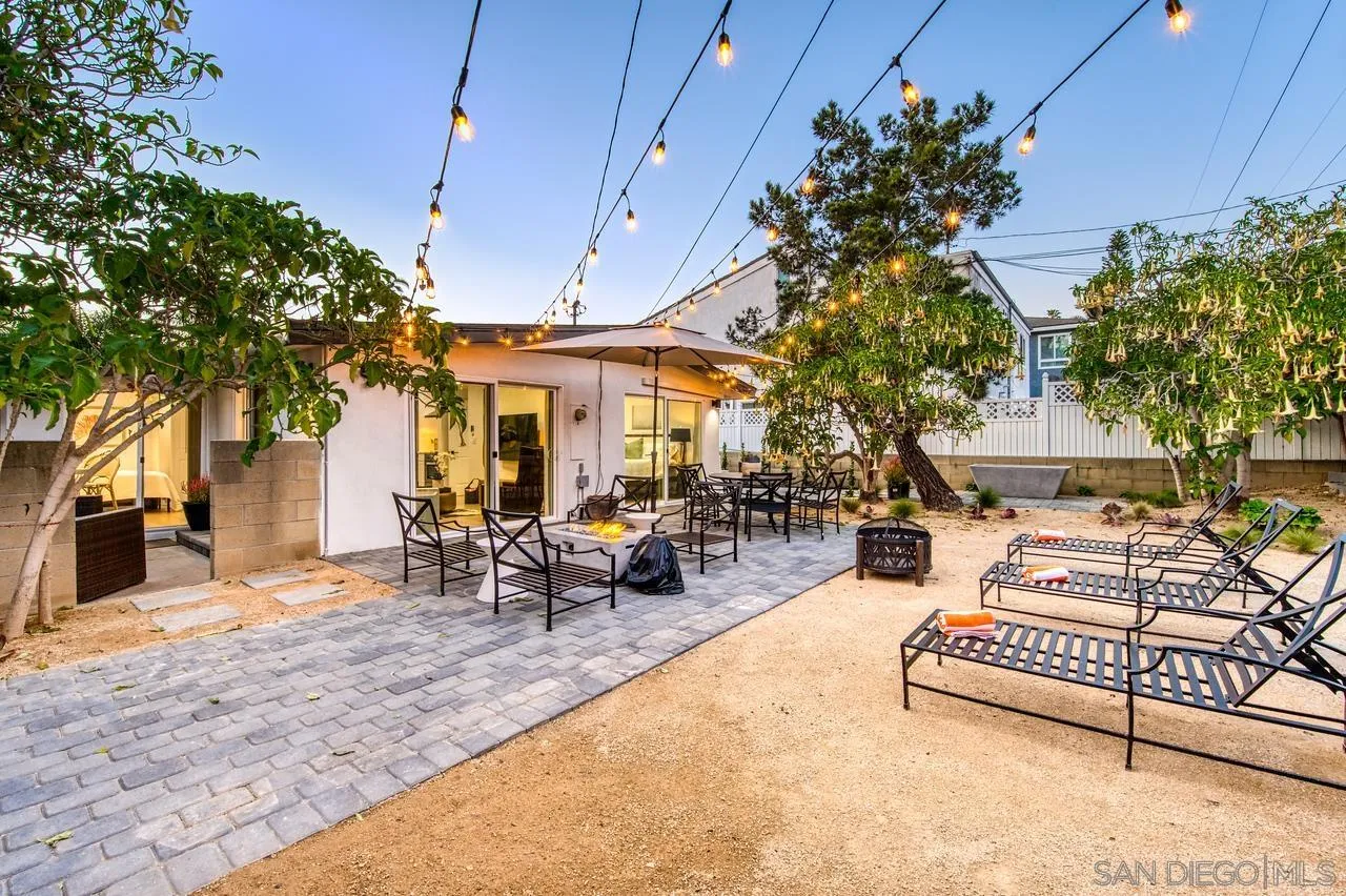 34082 La Serena Drive Dana Point, CA 92629 - Photo 30 of 43 a view of a patio with table and chairs potted plants and large tree