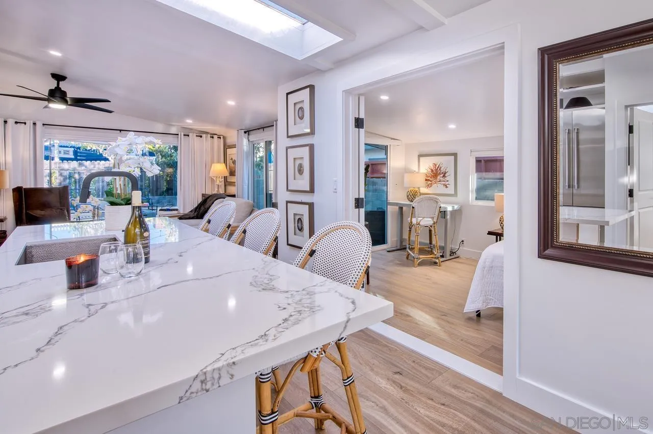 34082 La Serena Drive Dana Point, CA 92629 - Photo 7 of 43 a dining hall with stainless steel appliances furniture a large window and a wooden floor
