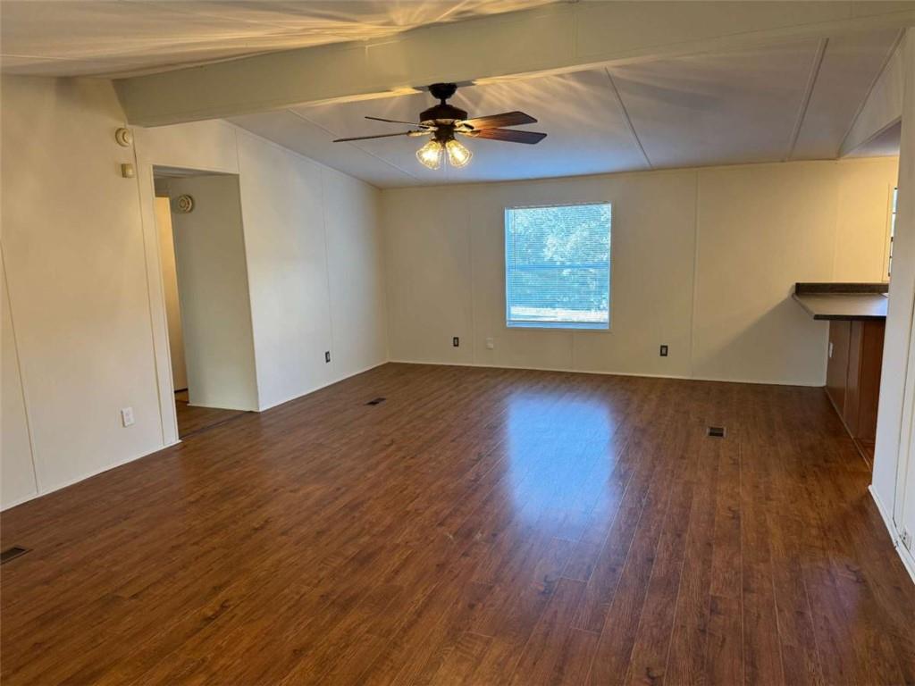 4044 Friendship Road Buford, GA 30519 - Photo 5 of 30 a view of an empty room with wooden floor