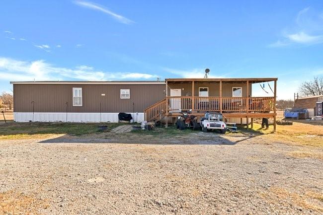 104 Private Road 1114 Decatur, TX 76234 - Photo 1 of 39 a view of a house with backyard and a patio