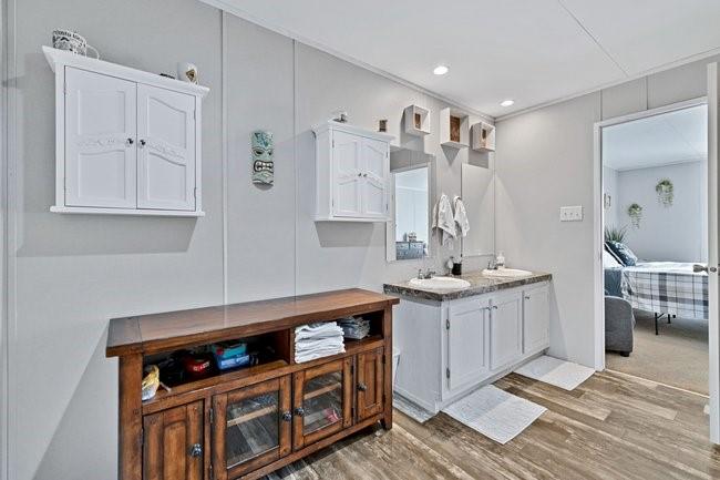 104 Private Road 1114 Decatur, TX 76234 - Photo 15 of 39 a kitchen with stainless steel appliances granite countertop a stove and a sink