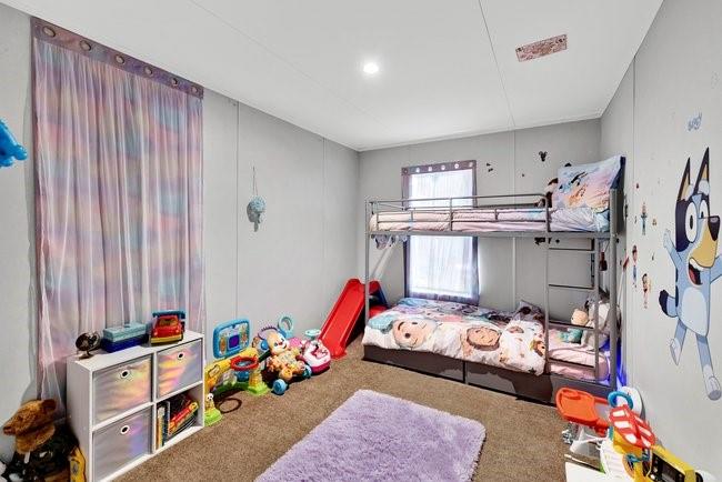 104 Private Road 1114 Decatur, TX 76234 - Photo 17 of 39 a bedroom with furniture and a window