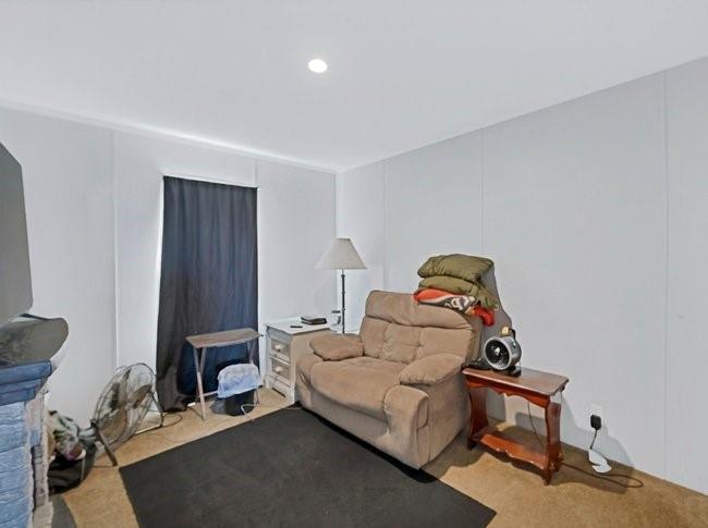 104 Private Road 1114 Decatur, TX 76234 - Photo 25 of 39 a bedroom with a bed and a couch