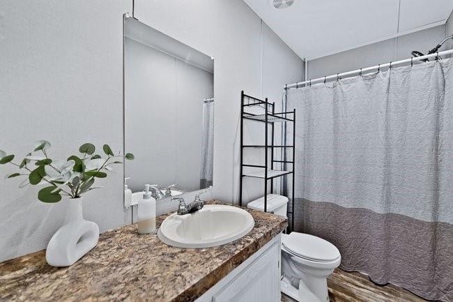 104 Private Road 1114 Decatur, TX 76234 - Photo 27 of 39 a bathroom with a sink toilet and shower