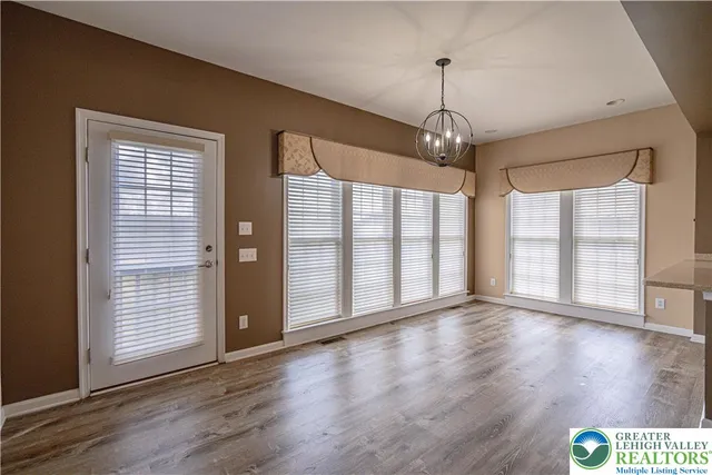 a bathroom with a sink a toilet and tub