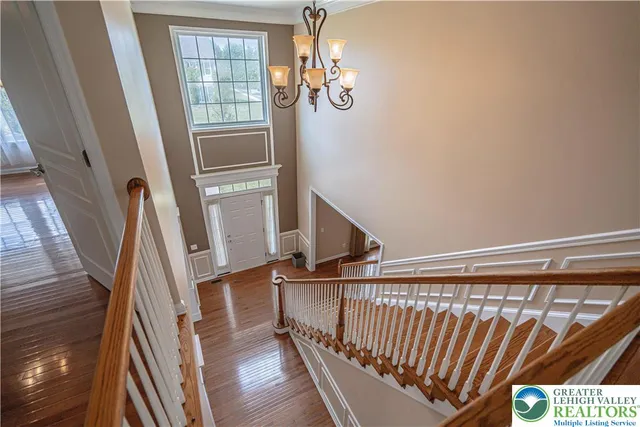 a large spacious bathroom with a large tub and shower