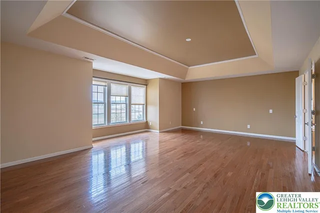 a spacious bathroom with a tub and shower