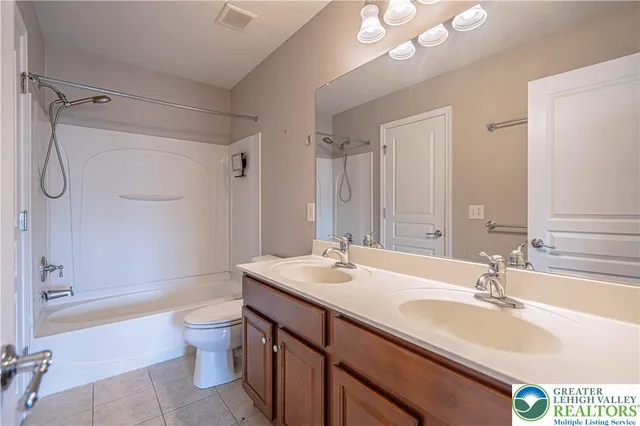 a view of a house with a big yard