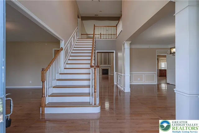 a view of entryway with wooden floor