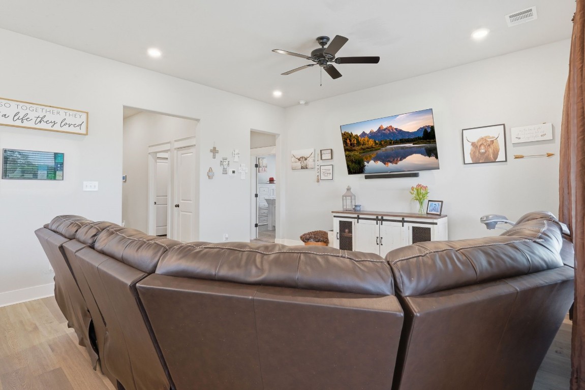 173 Brazos Bend Snook, TX 77879 - Photo 14 of 41 a living room with furniture and a flat screen tv