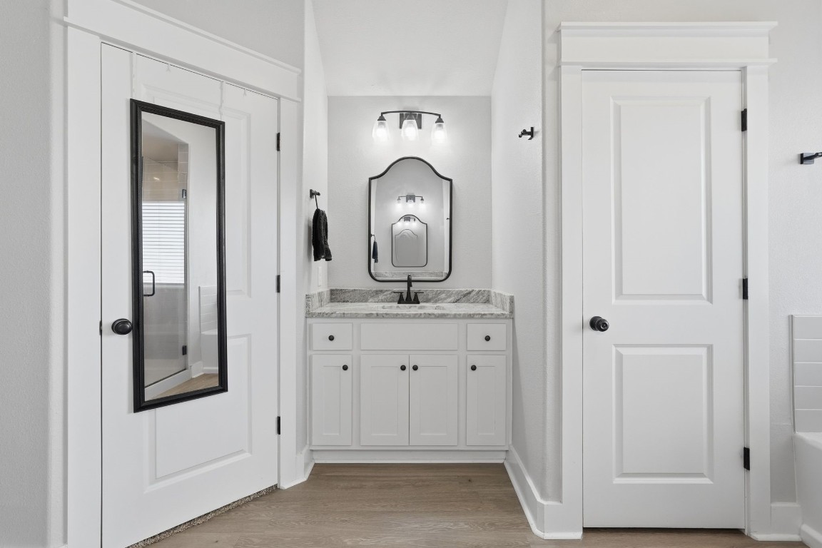 173 Brazos Bend Snook, TX 77879 - Photo 27 of 41 a view of a hallway with mirror