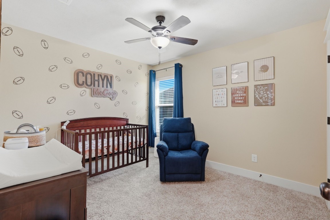173 Brazos Bend Snook, TX 77879 - Photo 28 of 41 a bedroom with furniture and a large window