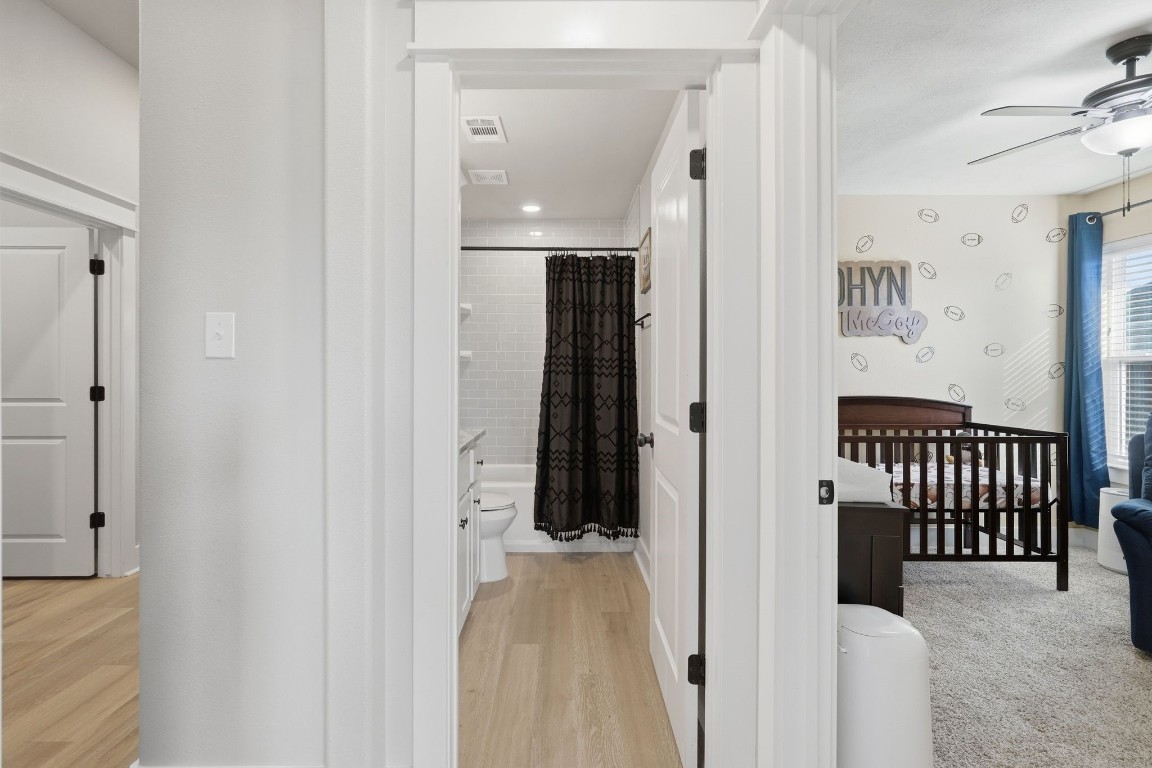 173 Brazos Bend Snook, TX 77879 - Photo 29 of 41 a view of a hallway with wooden shelves