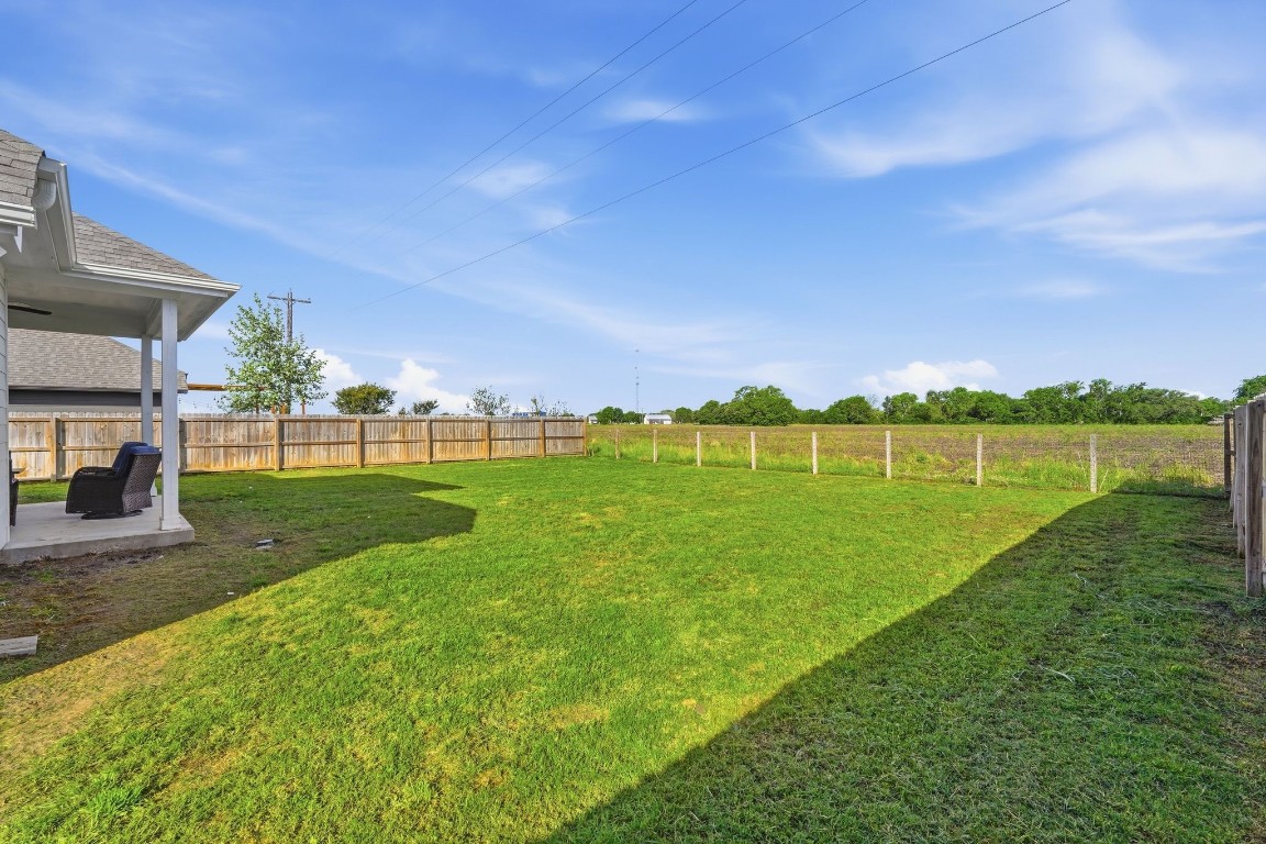 173 Brazos Bend Snook, TX 77879 - Photo 39 of 41 a view of a golf course with a lake