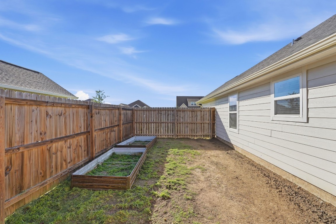 173 Brazos Bend Snook, TX 77879 - Photo 40 of 41 a view of a backyard with wooden fence