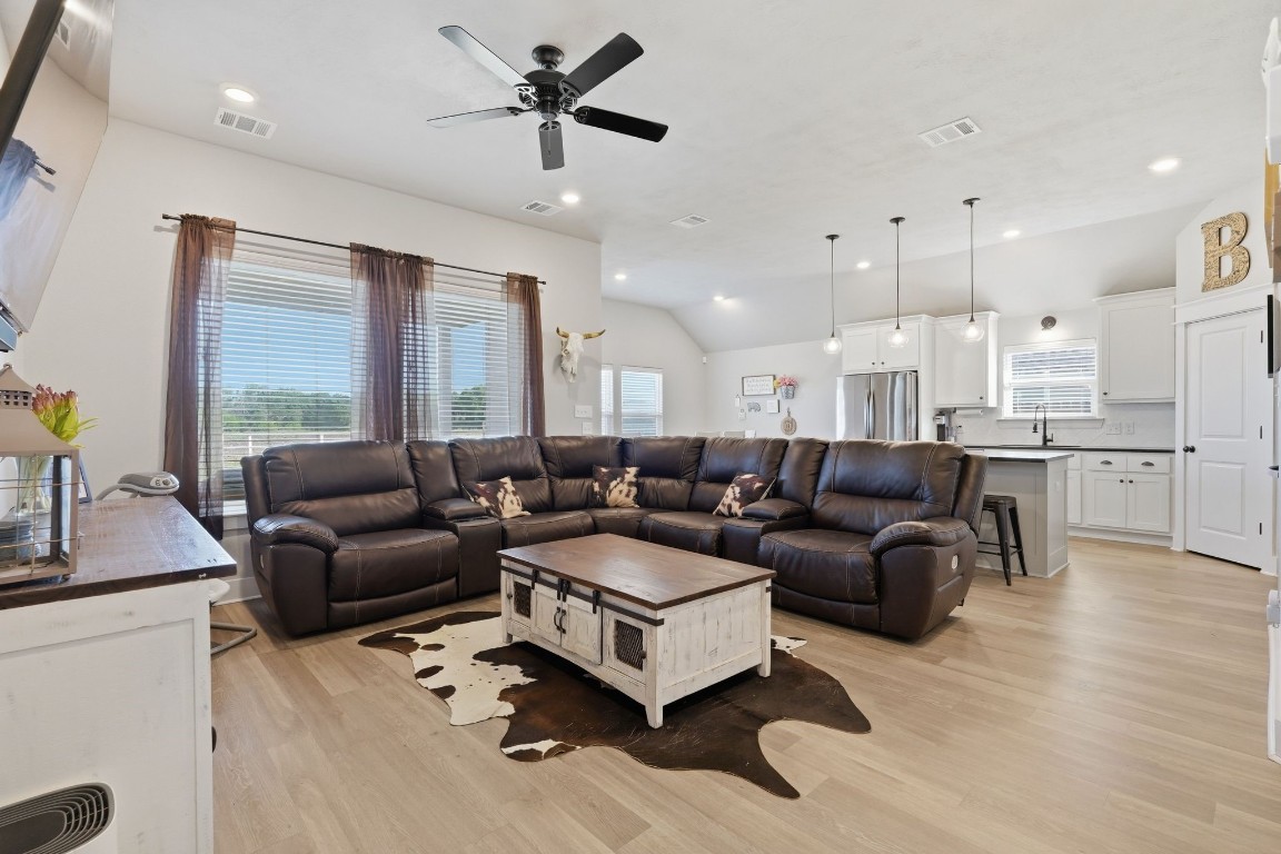 173 Brazos Bend Snook, TX 77879 - Photo 9 of 41 a living room with furniture and a large window