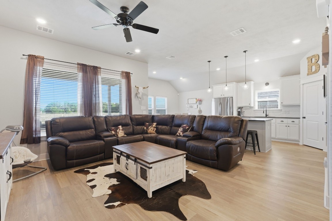 173 Brazos Bend Snook, TX 77879 - Photo 10 of 41 a living room with furniture and a large window