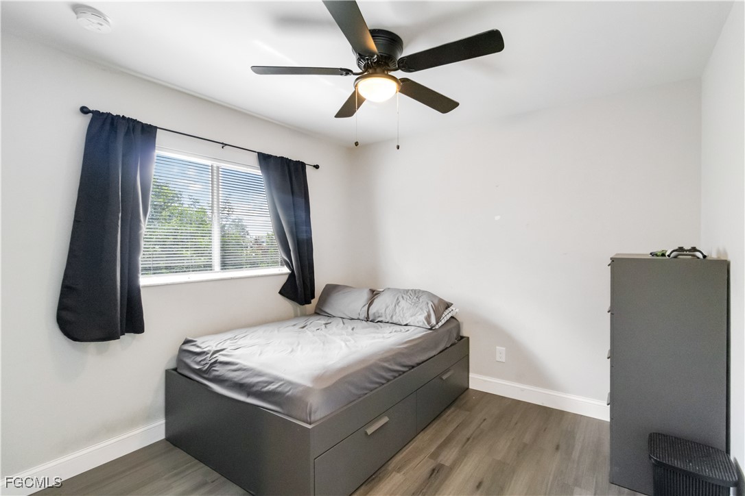 776-778 Alabama Road South Lehigh Acres, FL 33974 - Photo 27 of 50 a bedroom with a bed and a window