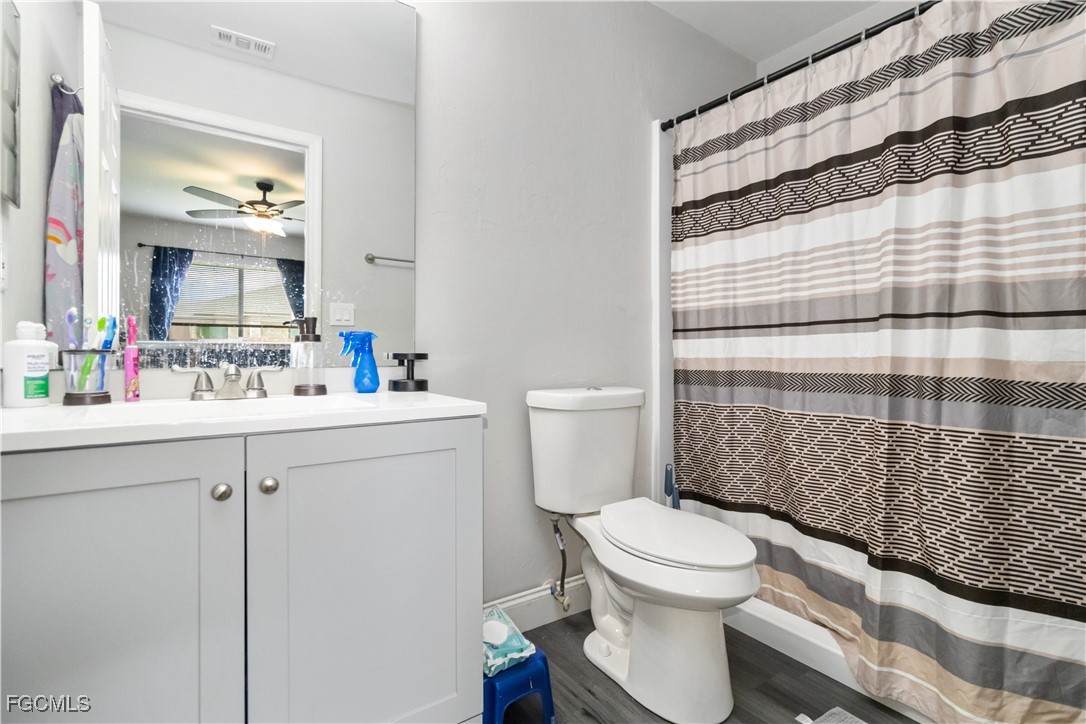 776-778 Alabama Road South Lehigh Acres, FL 33974 - Photo 28 of 50 a bathroom with a sink toilet and shower