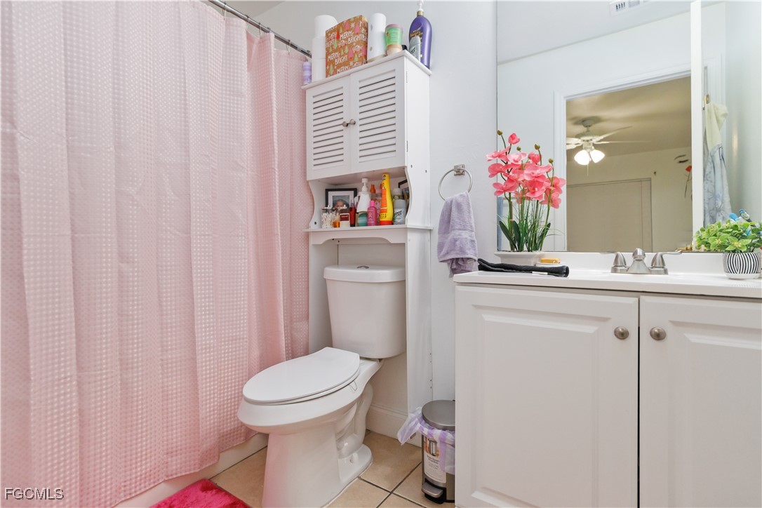 776-778 Alabama Road South Lehigh Acres, FL 33974 - Photo 29 of 50 a bathroom with a sink toilet and a mirror