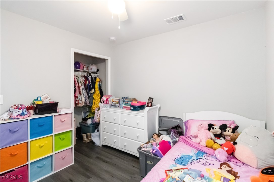 776-778 Alabama Road South Lehigh Acres, FL 33974 - Photo 32 of 50 a bed room with a bed and a dresser