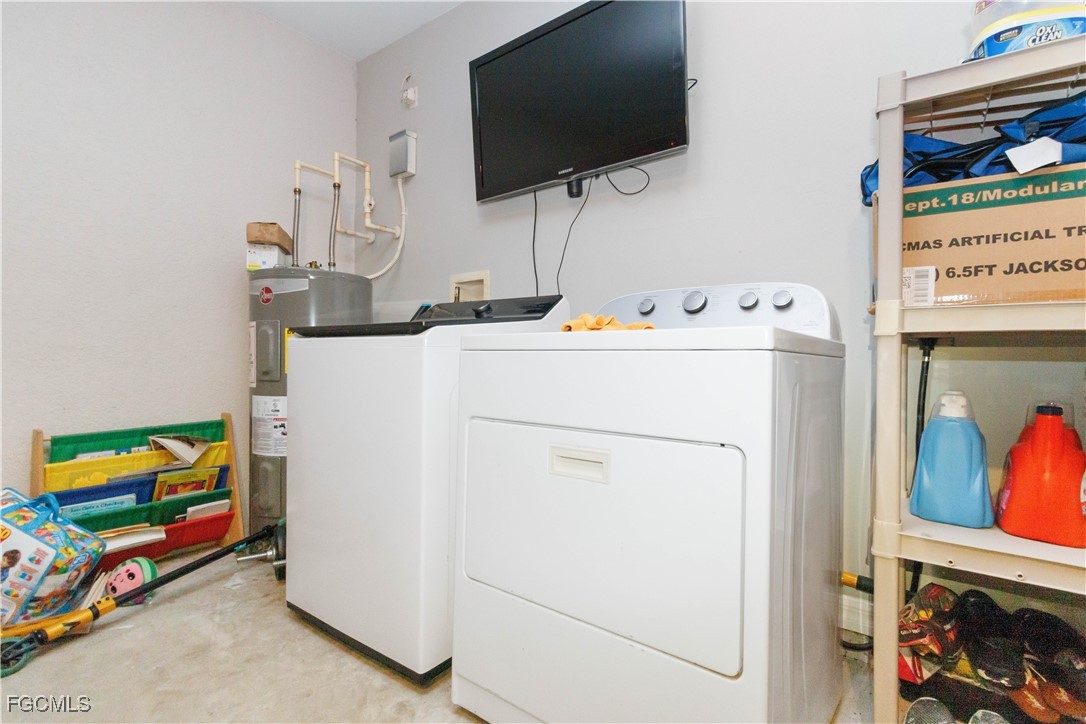 776-778 Alabama Road South Lehigh Acres, FL 33974 - Photo 34 of 50 a utility room with dryer and washer