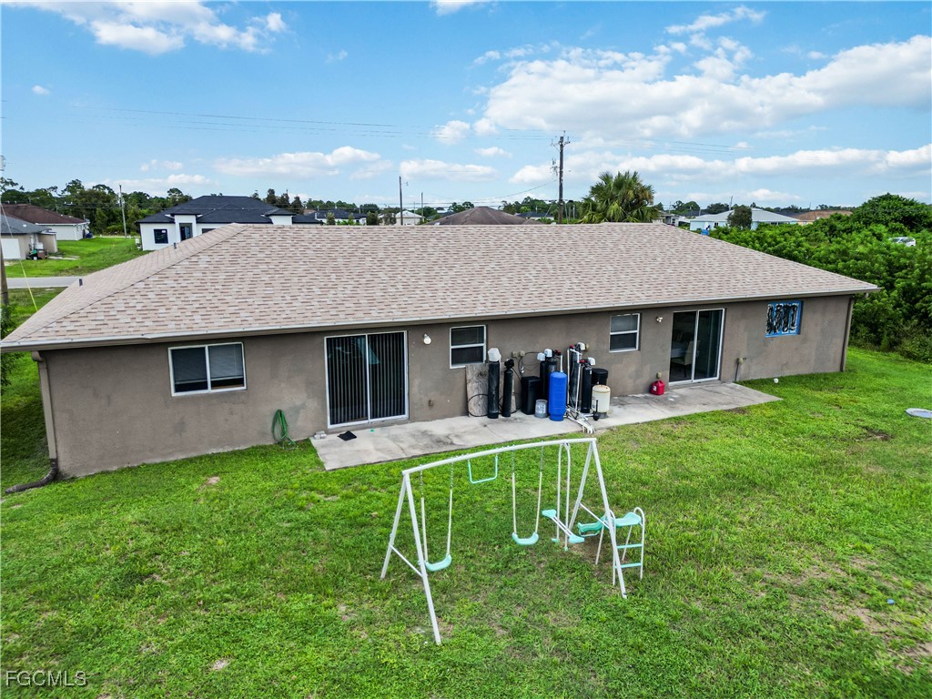 776-778 Alabama Road South Lehigh Acres, FL 33974 - Photo 50 of 50 a view of a house with a yard and sitting area