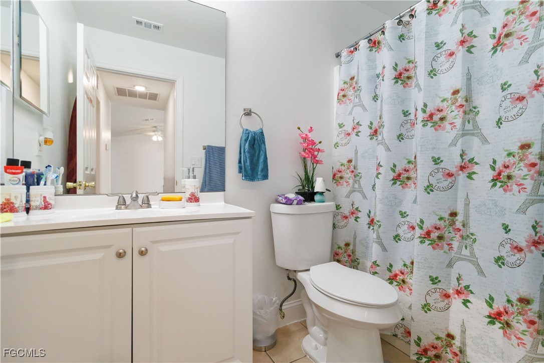 776-778 Alabama Road South Lehigh Acres, FL 33974 - Photo 5 of 50 a bathroom with a sink toilet and vanity