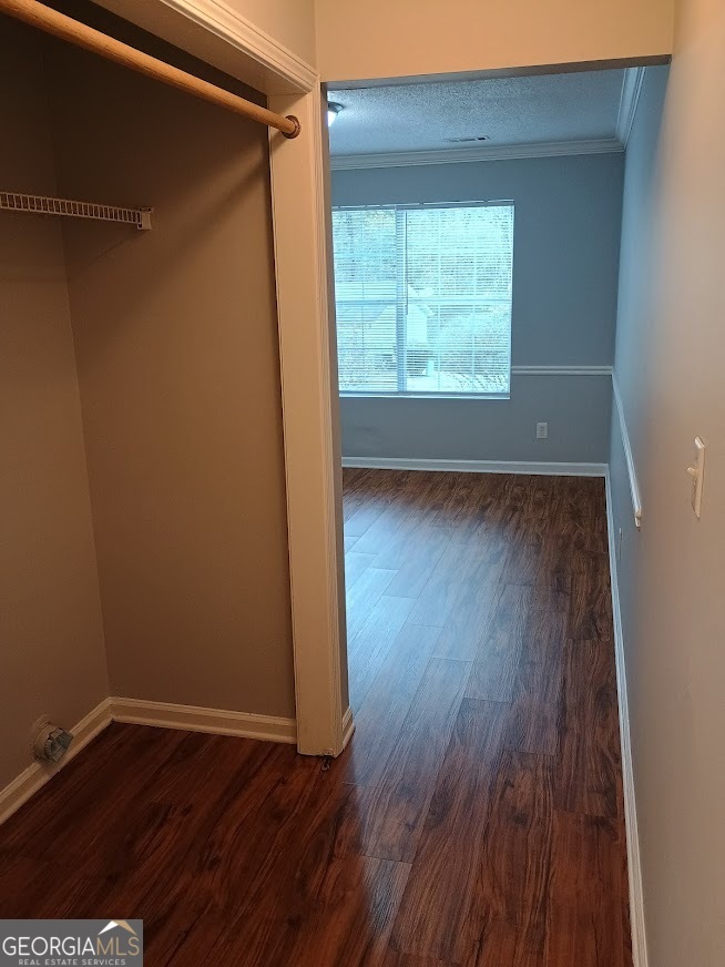 7355 Drake Avenue Lithonia, GA 30058 - Photo 5 of 20 a view of an empty room with wooden floor and a window
