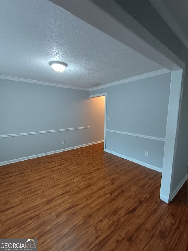 7355 Drake Avenue Lithonia, GA 30058 - Photo 10 of 20 wooden floor in an empty room with wooden floor