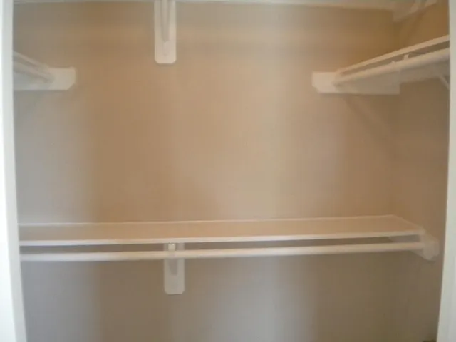 a view of a room with racks on the wall