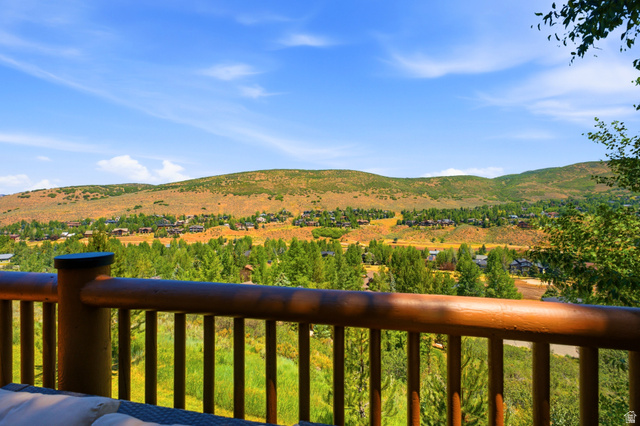 3148 Lower Saddleback Road Park City, UT 84098 - Photo 27 of 67 Log railing framing expansive mountain and valley scenery