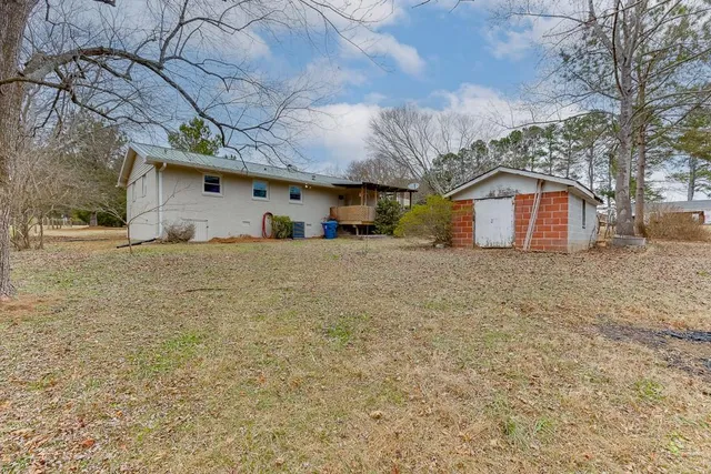 a view of a porch with wooden floor
