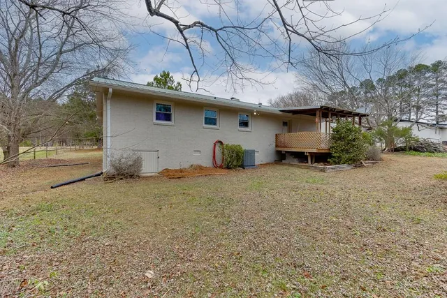 a room with furniture and a chandelier