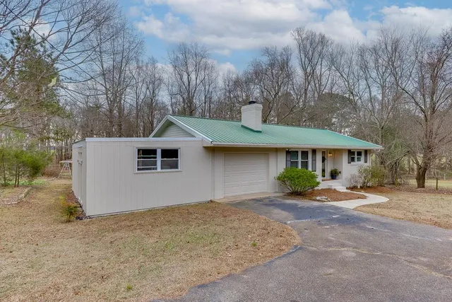 a house that has a lot of plants in it