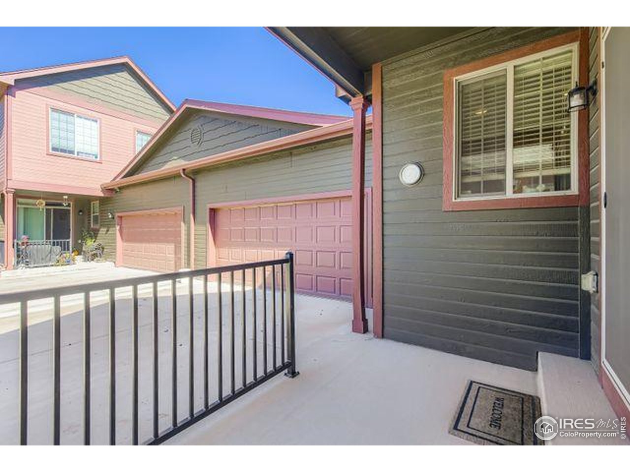 3453 Rhea Drive Loveland, CO 80537 - Photo 25 of 33 Back Porch and Garage