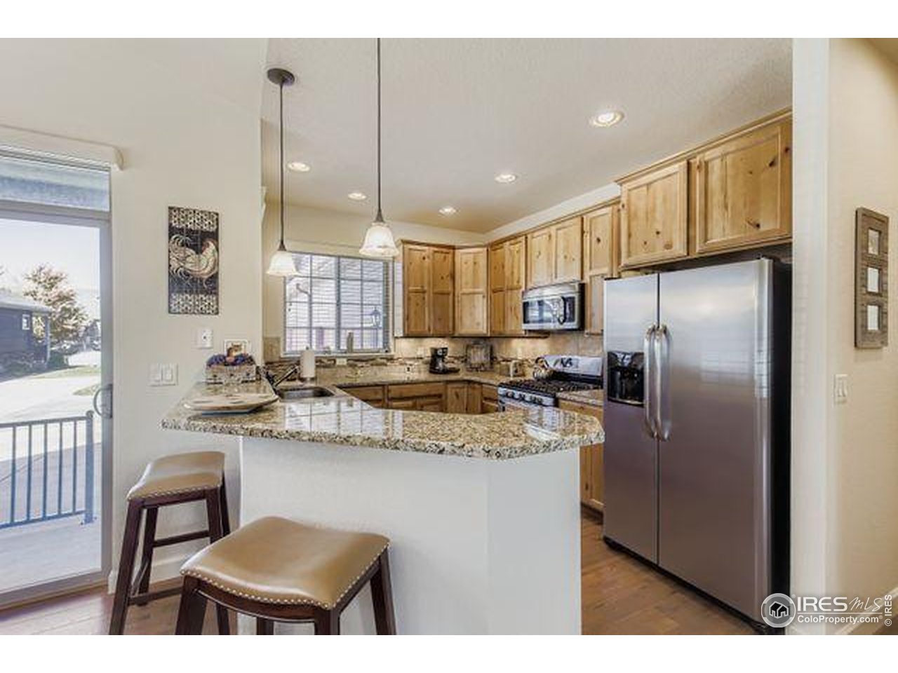 3453 Rhea Drive Loveland, CO 80537 - Photo 8 of 33 Breakfast Bar