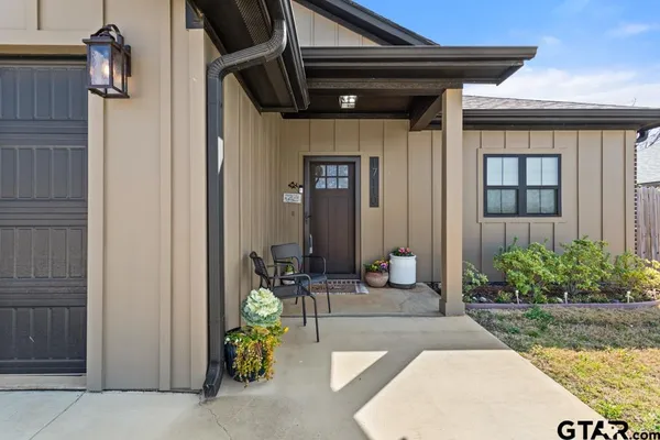 a view of a hallway with front door
