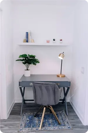 a view of living room with furniture and wooden floor