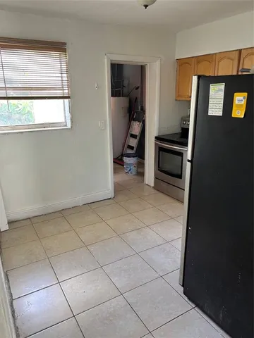 a utility room with cabinets
