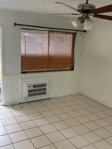 a view of a refrigerator and a window