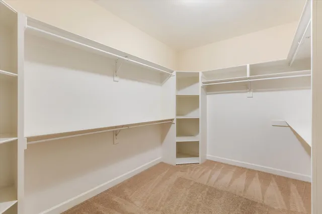 a view of an empty walk in closet