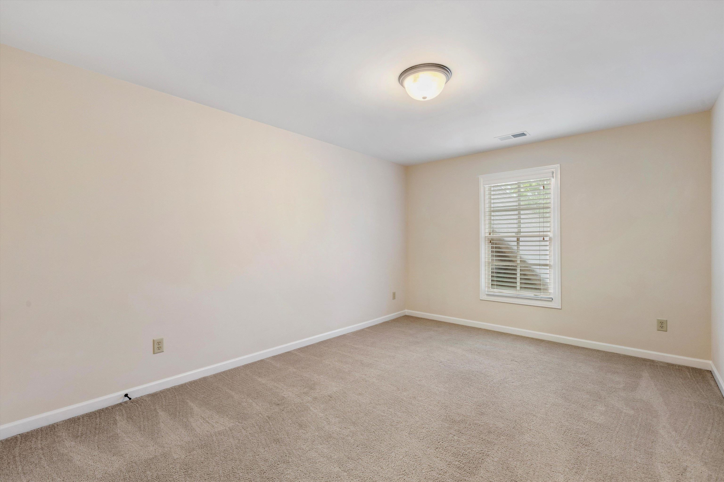 1651 Dehaig Lane Collierville, TN 38017 - Photo 29 of 36 an empty room with a window