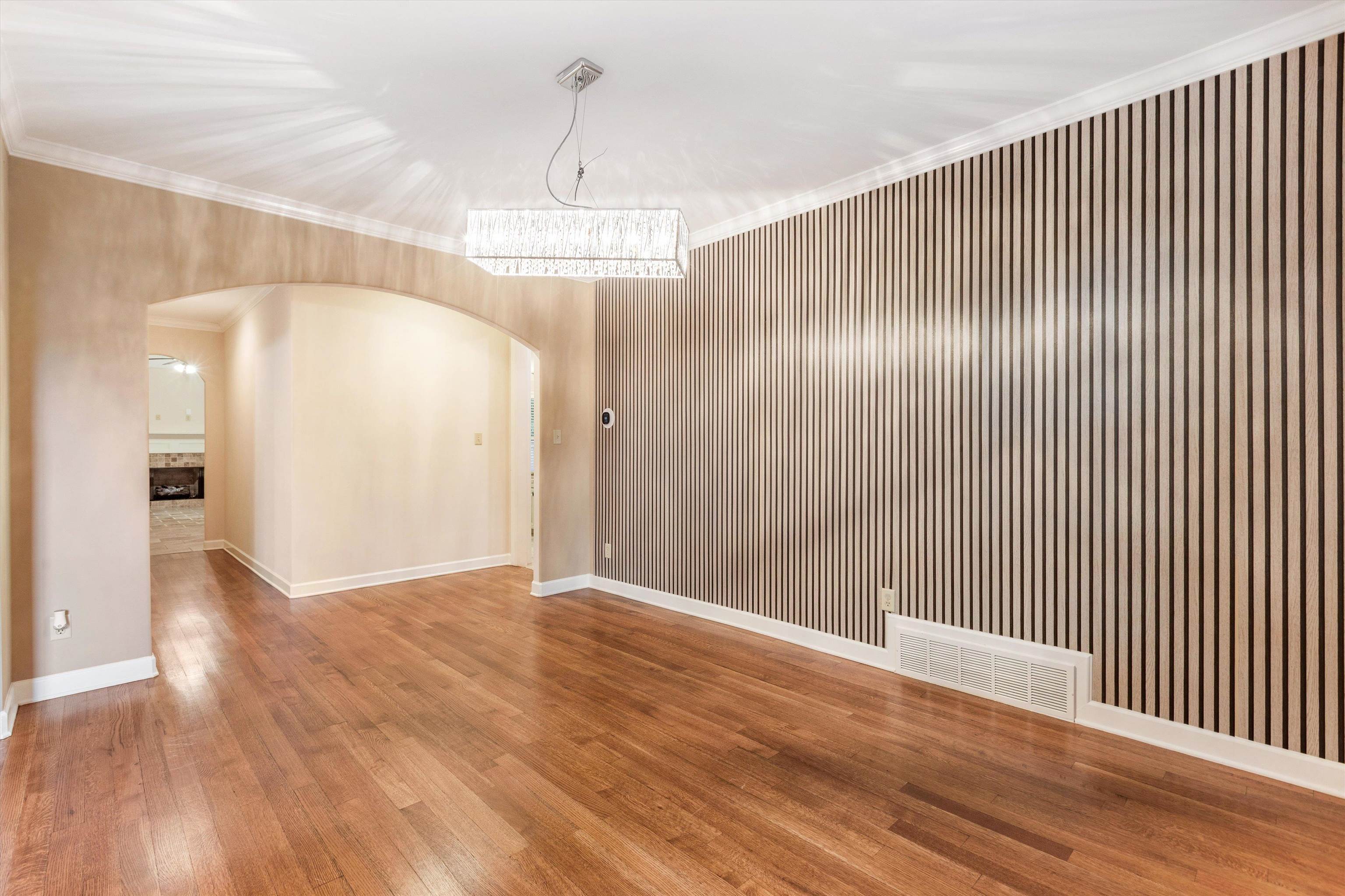 1651 Dehaig Lane Collierville, TN 38017 - Photo 5 of 36 a view of a hallway with wooden floor